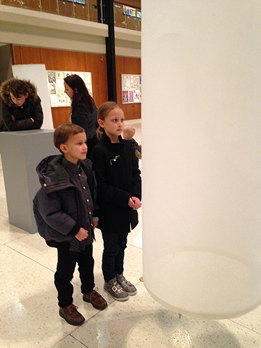 Two young visitors check out Rob and Georgia Buchert's installation at BYU's HFAC