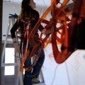 Meredith Pingree installing her work at the CUAC