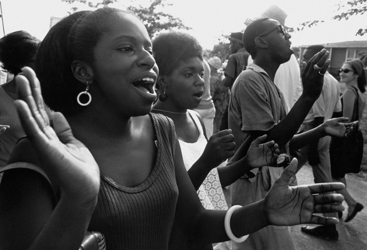Marchers sing freedom songs en route to Jackson. Photo by Matt Herron, 1966.