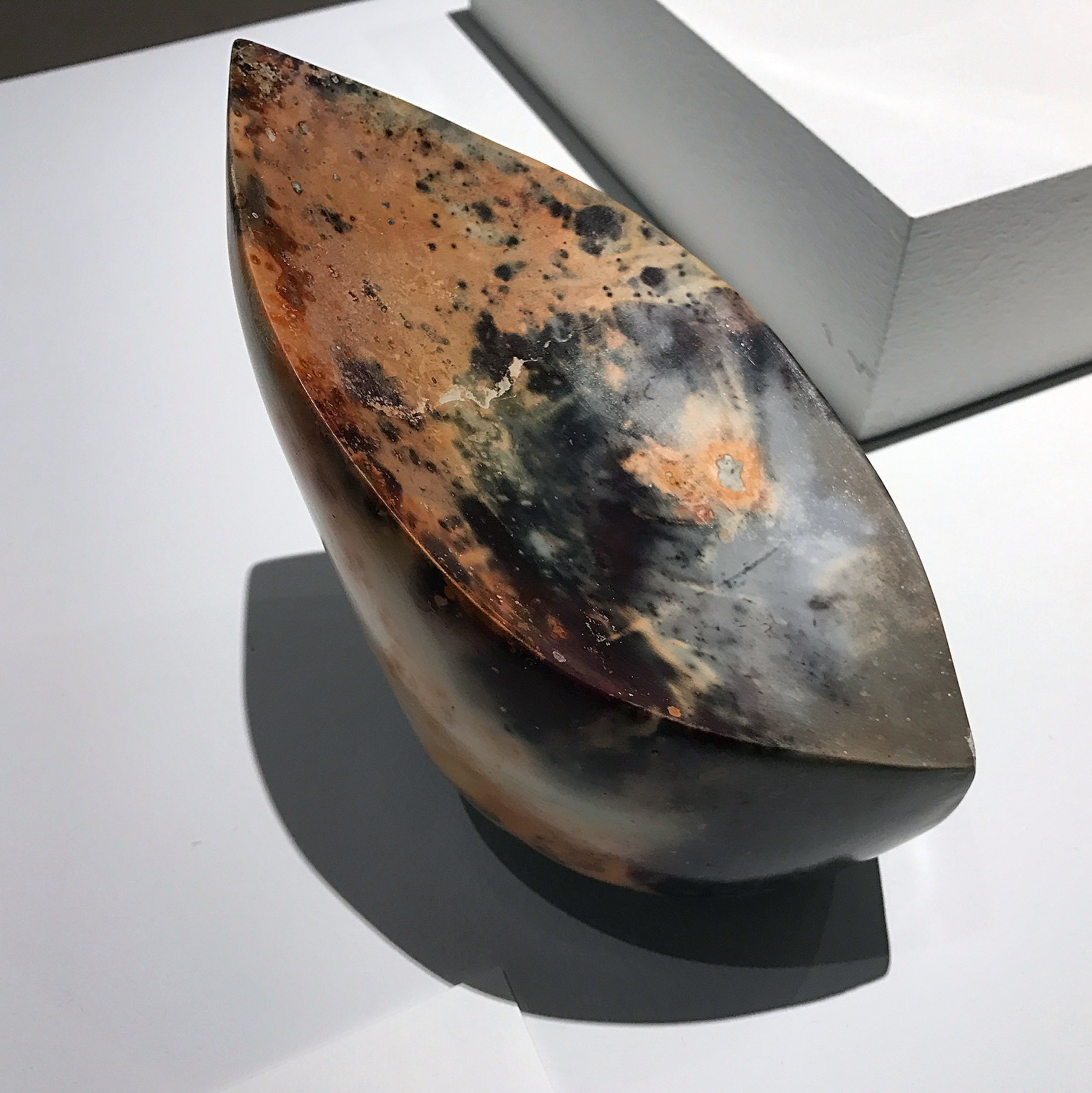 “New Moon II” by Barbara Ellard, 2016, pit fired ceramic, 5.5 × 4 × 7 in