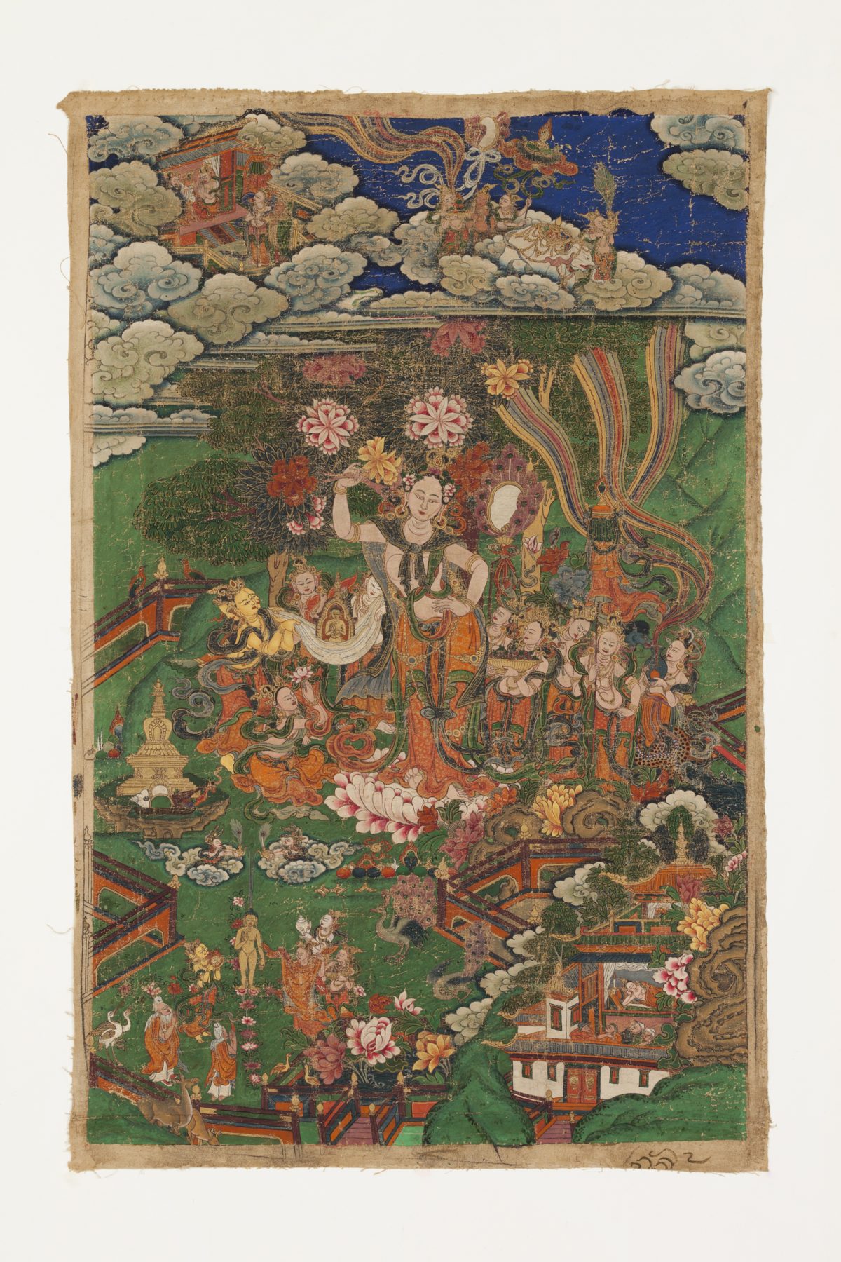 Color thangka painting of "The Birth of the Buddha" showing vibrant green and blue tones with floating clouds.