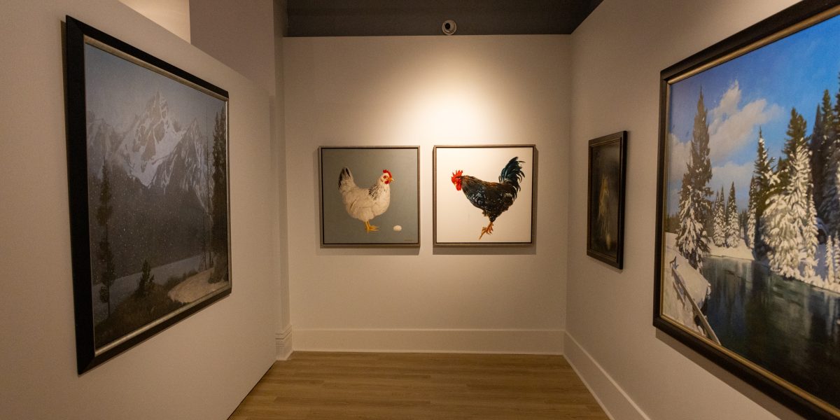 Gallery view showing paintings of a mountain landscape, a white hen and rooster, and a winter forest scene.